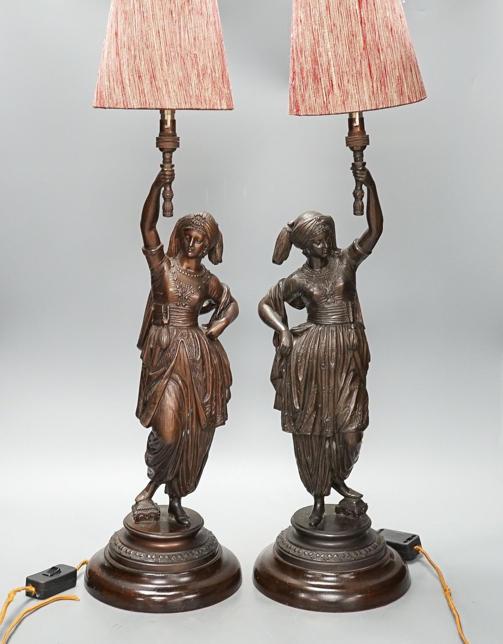 A pair of spelter figural table lamps, 50cm